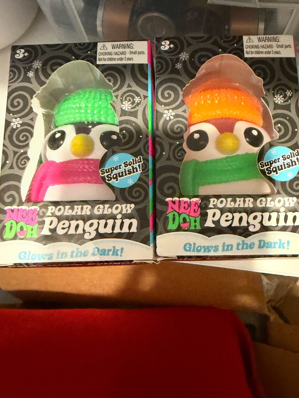 Two NeeDoh Polar Glow Penguin green & Pink hat - new and authentic